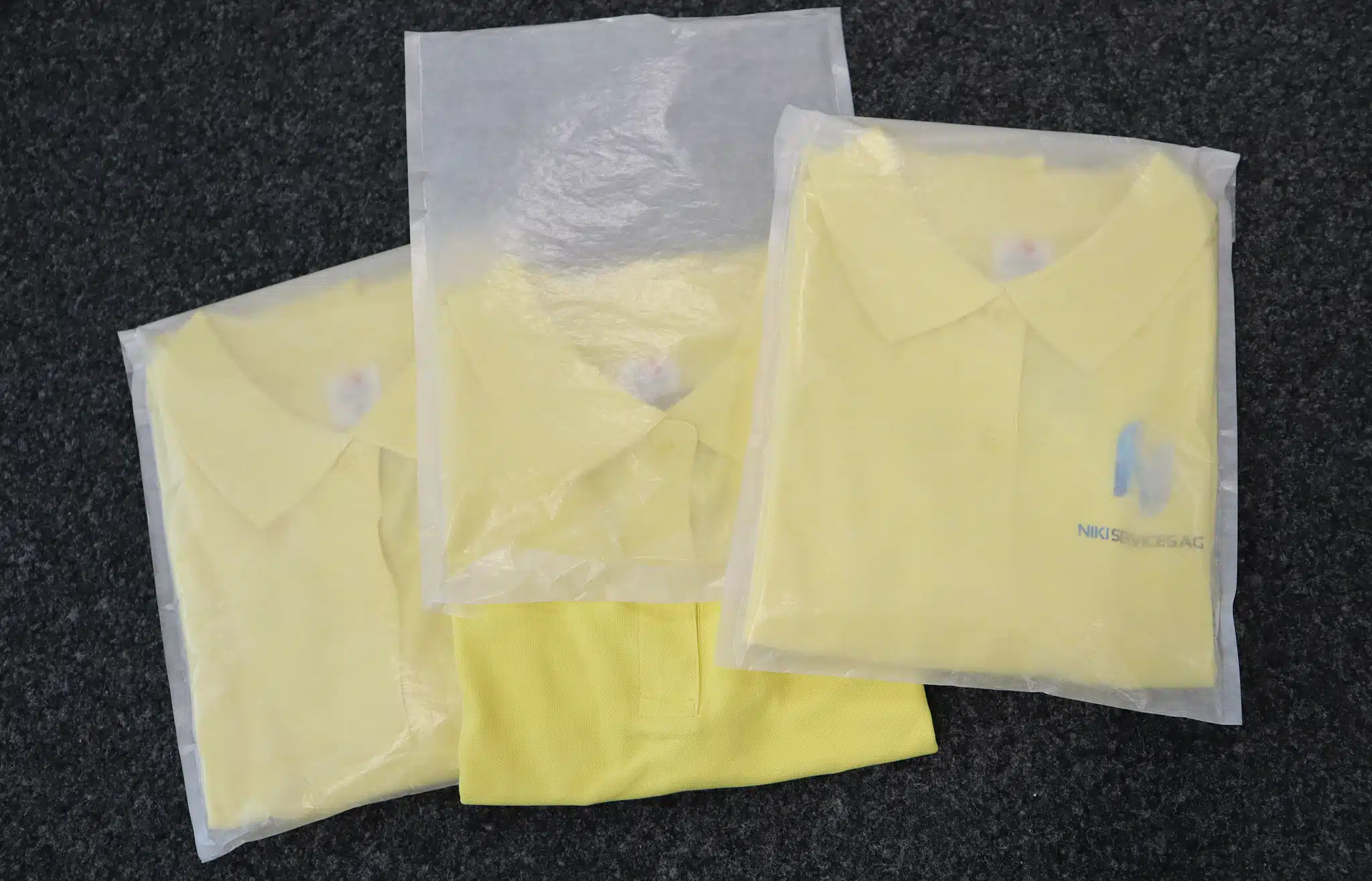 Amuris Arbeitskleider. Flammhemmender Textildruck auf Arbeitskleider von Portwest.